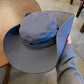 Cappellino con visiera larga 12 cm e protezione UV