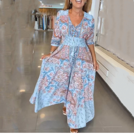 Abito lungo elegante con stampa floreale e cordoncino da donna