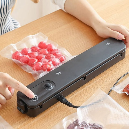 🎉🧺50% di sconto! Macchina sottovuoto automatica per alimenti – Freschezza prolungata, design compatto e 10 sacchetti inclusi
