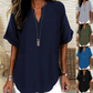 👚SCONTO DEL 60%! 🔥Top alla moda a maniche corte, ampio, con scollo a V profondo, orlo asimmetrico e tessuto leggero (5 colori, taglie dalla S alla 2XL) 🌸