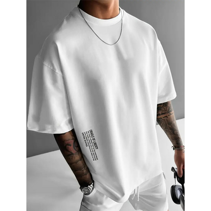 👕 ORA SCONTATO DEL 50%! ✨ Camicia da uomo a maniche corte dalla vestibilità ampia – Tessuto misto cotone di alta qualità, stampa grafica urbana e stile casual oversize 🏙️