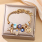 🌙 Braccialetto Celeste con Charm Sole, Luna & Stelle – Lega Dorata Lucida, Regolabile 18-22cm, Strass & Accenti Blu – Idea Regalo Originale 🌟💛